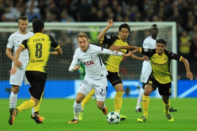 13th September 2017, Wembley Stadium, London, England; Champions League Group stage, Tottenham Hotspur versus Borussia Dortmund; Christian Eriksen of Tottenham Hotspur holds off Mahmoud Dahoud of Borussia Dortmund  ActionPlus11929752