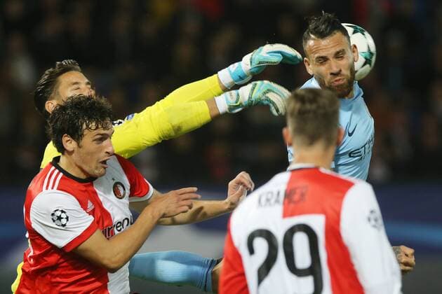 Eric Botteghin of Feyenoord, keeper Brad Jones of Feyenoord, Michiel Kramer of Feyenoord, Nicolas Otamendi of Manchester City during the UEFA Champions League group F match between Feyenoord Rotterdam and Manchester City at the Kuip on September 13, 2017 in Rotterdam, The Netherlands UEFA Champions League 2017 2018 xVIxVIxImagesx xTomxBodexMultimediaxIVx 8736045