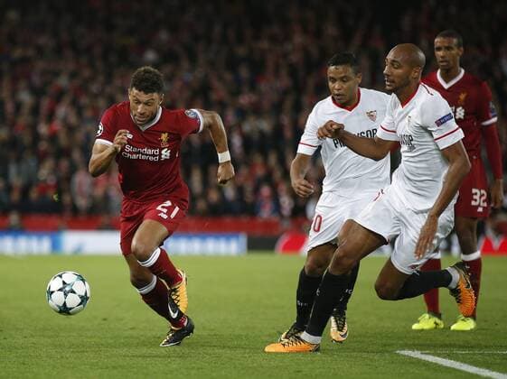 Alex Oxlade-Chamberlain of Liverpool gets clear of Steven NÕZonzi of Sevilla during the Champions League Group E match at the Anfield Stadium, Liverpool. Picture date 13th September 2017. Picture credit should read: Simon Bellis Sportimage EDITORIAL USE ONLY. No use with unauthorised audio, video, data, fixture lists, club league logos or live services. Online in-match use limited to 120 images, no video emulation. No use in betting, games or single club league player publications.