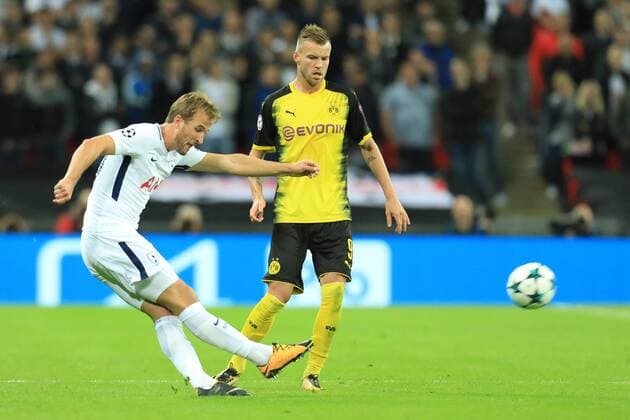 13th September 2017, Wembley Stadium, London, England; Champions League Group stage, Tottenham Hotspur versus Borussia Dortmund; Harry Kane of Tottenham Hotspur crosses the ball away from Andriy Yarmolenko of Borussia Dortmund  ActionPlus11929816