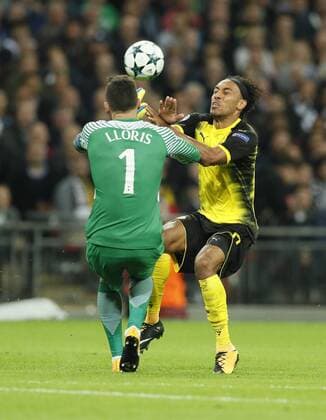 Tottenham s Hugo Lloris tussles with Dortmund s Pierre-Emerick Aubameyang during the champions league match at Wembley Stadium, London. Picture date 13th September 2017. Picture credit should read: David Klein Sportimage EDITORIAL USE ONLY. No use with unauthorised audio, video, data, fixture lists, club league logos or live services. Online in-match use limited to 120 images, no video emulation. No use in betting, games or single club league player publications.