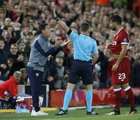 Referee Danny Makkelle sends Eduardo Berizzo manager of Sevilla to the stands during the Champions League Group E match at the Anfield Stadium, Liverpool. Picture date 13th September 2017. Picture credit should read: Simon Bellis Sportimage EDITORIAL USE ONLY. No use with unauthorised audio, video, data, fixture lists, club league logos or live services. Online in-match use limited to 120 images, no video emulation. No use in betting, games or single club league player publications.