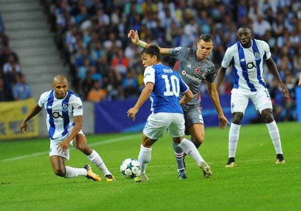 Pepe of Besiktas and Yacine Brahimi 8 , Oliver Torres 10 , Moussa Marega of Porto during the UEFA Champions League match between Porto and Besiktas at Estadio do Dragao Stadium in Porto , Portugal on September 13 , 2017. Final Scores : Porto 1 - Besiktas 3 