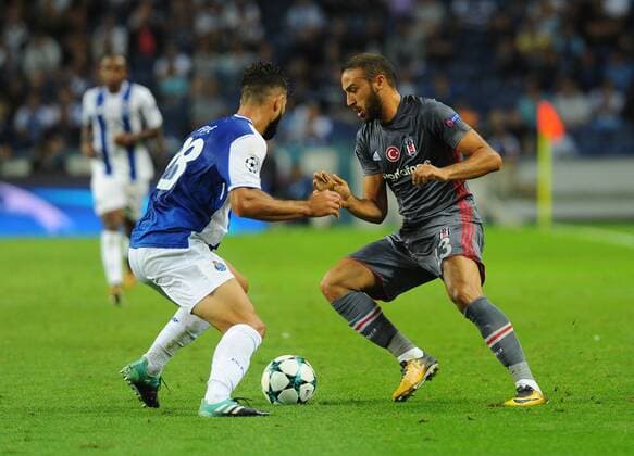 Cenk Tosun (R) of Besiktas and Felipe of Porto during the UEFA Champions League match between Porto and Besiktas at Estadio do Dragao Stadium in Porto , Portugal on September 13 , 2017. Final Scores : Porto 1 - Besiktas 3 