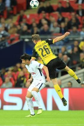 13th September 2017, Wembley Stadium, London, England; Champions League Group stage, Tottenham Hotspur versus Borussia Dortmund; & x141;ukasz Piszczek of Borussia Dortmund climbs over Son Heung-Min of Tottenham Hotspur  ActionPlus11929857