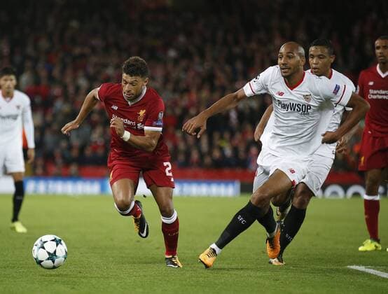 Alex Oxlade-Chamberlain of Liverpool and Steven NÕZonzi of Sevilla during the Champions League Group E match at the Anfield Stadium, Liverpool. Picture date 13th September 2017. Picture credit should read: Simon Bellis Sportimage EDITORIAL USE ONLY. No use with unauthorised audio, video, data, fixture lists, club league logos or live services. Online in-match use limited to 120 images, no video emulation. No use in betting, games or single club league player publications.