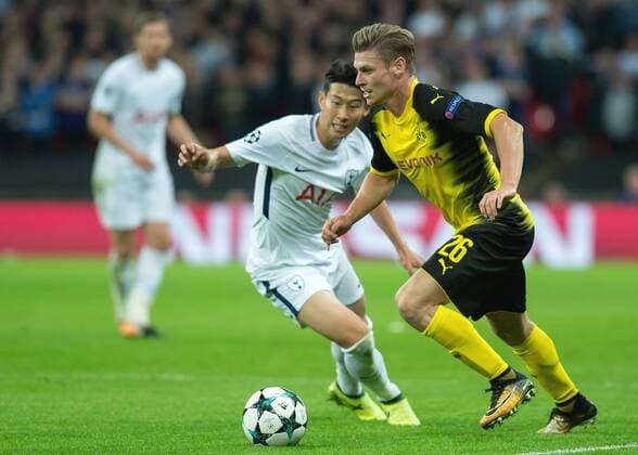 Åukasz Piszczek of Borussia Dortmund goes past Son Heung-Min of Tottenham Hotspur during the UEFA Champions League group stage match between Tottenham Hotspur and Borussia Dortmund at Wembley Stadium, London, England on 13 September 2017. Copyright: xVincexMignottx 16640059