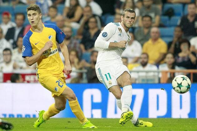 Real Madrid s Garet Bale (r) and Apoel FC s Praxiteles Vouros during Champions League Group H match 1. September 13,2017.  (20170913105)