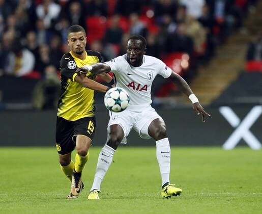 Tottenham s Moussa Sissoko tussles with Dortmund s Jeremy Toljan during the champions league match at Wembley Stadium, London. Picture date 13th September 2017. Picture credit should read: David Klein Sportimage EDITORIAL USE ONLY. No use with unauthorised audio, video, data, fixture lists, club league logos or live services. Online in-match use limited to 120 images, no video emulation. No use in betting, games or single club league player publications.