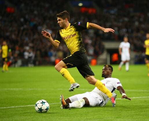 September 13, 2017 - London, England, United Kingdom - Christian Pulisic of Borussia Dortmund gets tackled by Tottenham Hotspur s Serge Aurier.during Champion League Group H match between Tottenham Hotspur against Borussia Dortmund at Wembley stadium, London, UK on 13 Sepember 2017. Tottenham won the game 3-1. Tottenham Hotspur v Borussia Dortmund - UEFA Champions League  - ZUMAn230 20170913_zaa_n230_462 Copyright: xKieranxGalvinx
