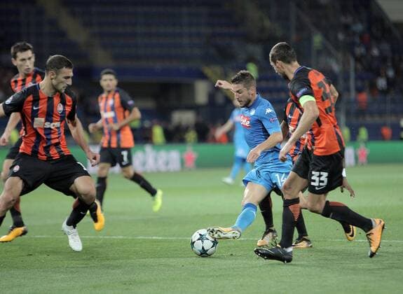 Forward Dries Mertens (2nd R) of SSC Napoli and defender Darijo Srna (R) of FC Shakhtar Donetsk are seen in action during the UEFA Champions League Group F game at the Metalist Stadium in Kharkiv, northeastern Ukraine, September 13, 2017. Ukrinform. KHARKIV. FC Shakhtar Donetsk has claimed a 2-1 win over SSC Napoli during the UEFA Champions League Group F game at the Metalist Stadium in Kharkiv on September 13. Pitmen s midfielder Taison (15 ) put his team on the road to victory early in the game, while forward Facundo Ferreyra (58 ) sealed the lead. Although Napoli s forward Arkadiusz Milik (72 ) took a successful penalty kick, the hosts held on for victory. The triumph in Kharkiv added up to Shakhtar s wins in the first seven competitive matches this season. On the other hand, the defeat meant for SSC Napoli the end of the winning streak after five straight victories. Shakhtar scores 2-1 in Kharkiv, ends Napoli s winning streak  Copyright: xVyacheslavxMadiyevskyyx