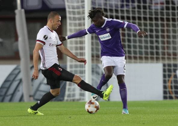 SOCCER - EL, Austria vs Milano VIENNA,AUSTRIA,14.SEP.17 - SOCCER - UEFA Europa League, group stage, FK Austria Wien VS AC Milano. Image shows Luca Antonelli (AC Milan) and Abdul Kadiri Mohammed (A.Wien). GEPAxpictures xChristianxOrt