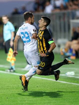SOCCER - EL, Rijeka vs Athens RIJEKA,CROATIA,14.SEP.17 - SOCCER - UEFA Europa League, group stage, HNK Rijeka vs AEK Athens. Image shows Marko Vesovic (Rijeka) and Petros Mantalos (Athens). GEPAxpictures xMaticxKlansek