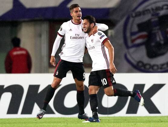 SOCCER - EL, Austria vs Milano VIENNA,AUSTRIA,14.SEP.17 - SOCCER - UEFA Europa League, group stage, FK Austria Wien VS AC Milano. Image shows the rejoicing of Andre Silva (AC Milan) and Hakan Calhanoglu (AC Milan). GEPAxpictures xChristianxOrt