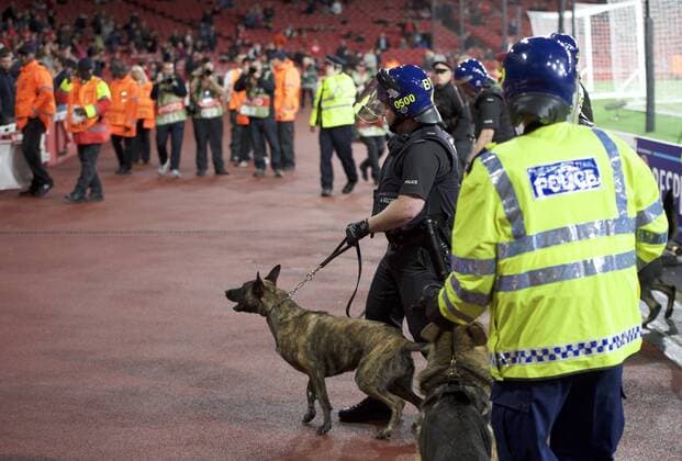 Arsenal v FC Cologne UEFA Champions League Police with dogs come into the stadium to control the crowds before the UEFA Champions League match at the Emirates Stadium, London Content Not Available For UK Newspapers Copyright: xAlanxStanfordx FIL-10666-0008