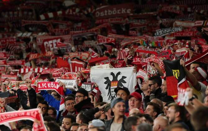 14th September 2017, Emirates Stadium, London, England; UEFA Europa League Group stage, Arsenal versus FC Cologne; FC Koln fans holds scarves and flags up, chanting before kick off  ActionPlus11930008