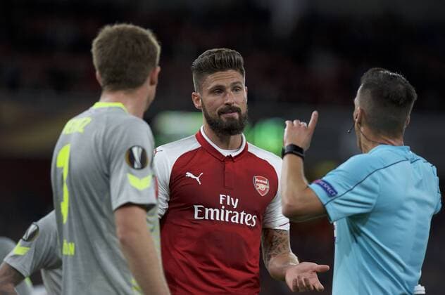 Arsenal v FC Cologne UEFA Champions League Referee Xavier Estrada Fernandez has a word with Olivier Giroud of Arsenal during the UEFA Champions League match at the Emirates Stadium, London Content Not Available For UK Newspapers Copyright: xAlanxStanfordx FIL-10666-0034