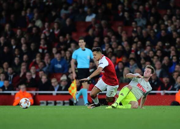 14th September 2017, Emirates Stadium, London, England; UEFA Europa League Group stage, Arsenal versus FC Cologne; Alexis Sanchez of Arsenal is fouled by Lukas Klunter of FC Koln and awarded a free kick  ActionPlus11930083
