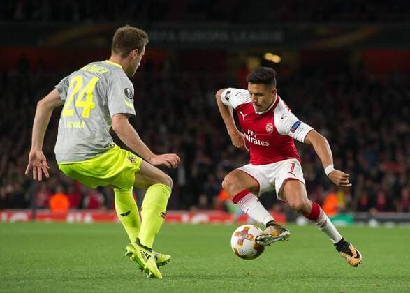 Alexis Sanchez of Arsenal takes on Lukas Klünter of FC Colgne during the UEFA Europa League group stage match between Arsenal and FC Cologne at the Emirates Stadium, London, England on 14 September 2017. Copyright: xVincexMignottx 16660026
