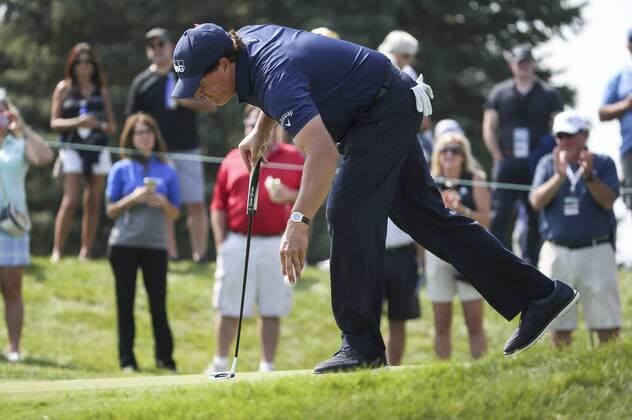 Golf, BMW Championship in Lake Forest September 14, 2017 - Chicago, IL, USA - Phil Mickelson finishes putting the on the 13th hole during the first round of the BMW Championship on Thursday, Sept. 14, 2017, at Conway Farms Golf Club in Lake Forest, Ill. With new caddies, Phil Mickelson, Jason Day get their mojo back at BMW Championship - ZUMAm67_ 20170914_zaf_m67_044 Copyright: xLouxFogliax