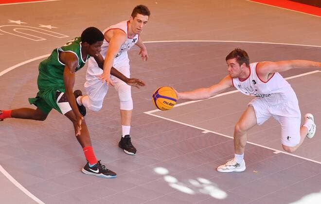 (170915) -- XIAMEN, Sept. 15, 2017 -- James Michael Cawthorn (R) from Lincoln University of New Zealand vies for the ball during the 3X3 FISU World University League-2017 Finals between Lincoln University of New Zealand and Makerere University of Uganda, in Xiamen, southeast China s Fujian Province, Sept. 14, 2017. ) (hcs) (SP)CHINA-XIAMEN-BASKETBALL-FISU-WORLD UNIVERSITY LEAGUE LinxShanchuan 