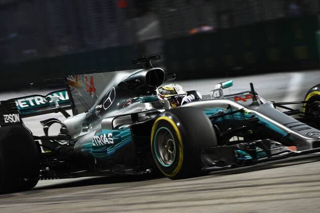 (170915) -- SINGAPORE, Sept. 15, 2017 -- Mercedes British driver Lewis Hamilton drives during the first practice session of the Formula One Singapore Grand Prix in Singapore on Sept. 15, 2017. ) (SP)SINGAPORE-FORMULA ONE-SINGAPORE GRAND PRIX-PRACTICE ThenxChihxWey 