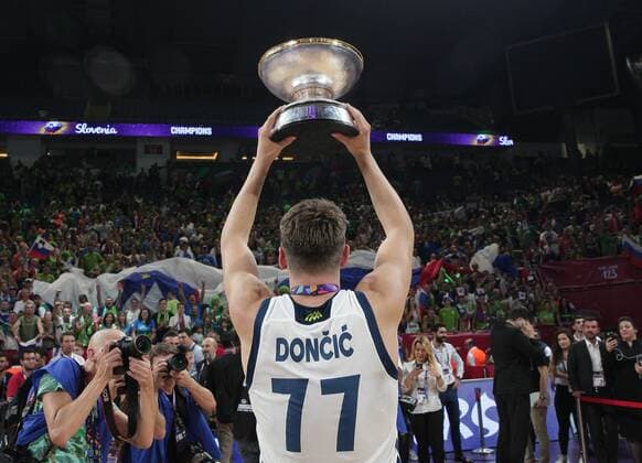 FIBA Eurobasket FINAL match between Slovenia and Serbia at Sinan Erdem Arena in Istanbul , Turkey on September 17 , 2017. Pictured : Slovenia player Luka Doncic poses for the media with championship tropy. 