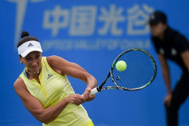 (170922) -- WUHAN, Sept. 22, 2017 -- Aleksandrina Naydenova of Bulgaria returns the ball during the singles qualifying match against Maria Sakkari of Greece at 2017 WTA Tennis Damen Wuhan Open in Wuhan, capital of central China s Hubei Province, on Sept. 22, 2017. Aleksandrina Naydenova lost 0-2.)(wll) (SP)CHINA-WUHAN-TENNIS-WTA-WUHAN OPEN-DAY 1(CN) ZhangxDuan 