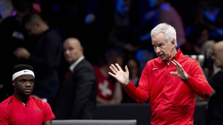 L-R US tennis player FRANCIS TIAFOE (Team World) and his captain John McEnroe are seen during the first match, singles, within the first edition of the Laver Cup tennis tournament in Prague, Czech Republic, on September 22, 2017. (CTKxPhoto MichalxKamaryt) CTKPhotoP201709220603901  kmt 20