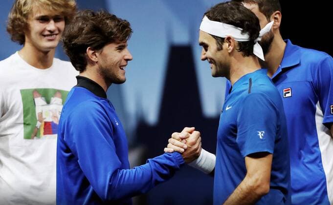 TENNIS - Laver Cup 2017 PRAGUE,CZECH REPUBLIC,23.SEP.17 - TENNIS - Laver Cup, Team Europe vs Team World. Image shows Dominic Thiem (AUT) and Roger Federer (SUI). GEPAxpictures xMatthiasxHauer