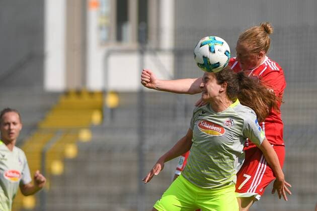 Bilder des Tages - SPORT v.li.: Julia Arnold (Köln, 31) Melanie Behringer (FC Bayern München, FCB, 7) im Kopfballduell, Zweikampf, Duell, duel, tackle, Dynamik, Action, Aktion, Fussball,Allianz Frauen-Bundesliga, FC Bayern München - 1. FC Köln, xslx