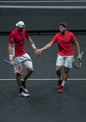September 24, 2017 - Prague, Czech Republic - John Isner and Jack Sock of Team World celebrate during there mens doubles match between Tomas Berdych and Marin Cilic of Team Europe on the final day of the Laver cup on September 24, 2017 in Prague, Czech Republic. The Laver Cup consists of six European players competing against their counterparts from the rest of the World. Europe will be captained by Bjorn Borg and John McEnroe will captain the Rest of the World team. The event runs from 22-24 September. Laver Cup - Day Three  - ZUMAn230 20170924_zaa_n230_052 Copyright: xRobertxSzaniszlox