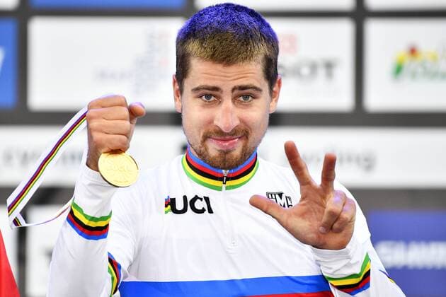 Slovakian Peter Sagan of Bora-Hansgrohe celebrates on the podium after winning the men s elite road race at the 2017 UCI Road World Cycling Championships in Bergen, Norway, Sunday 24 September 2017. YORICKxJANSENS  x05171942x