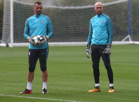 September 26, 2017 - London, United Kingdom - L-R Chelsea s Eduardo and Chelsea s Willy Caballero.during Chelsea Training session priory to they game against Atletico Madrid at Chelsea Training Ground on in Cobham, 26 Sept 2017 Chelsea Training Session  - ZUMAn230 20170926_zaa_n230_012 Copyright: xKieranxGalvinx
