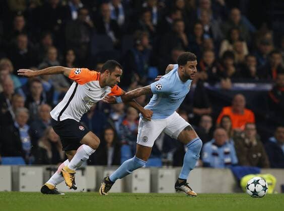 Taras Stepanenko of Shaktar Donetsk challenges Kyle Walker of Manchester City during the Champions League Group F match at the Emirates Stadium, Manchester. Picture date: September 26th 2017. Picture credit should read: Andrew Yates Sportimage EDITORIAL USE ONLY. No use with unauthorised audio, video, data, fixture lists, club league logos or live services. Online in-match use limited to 120 images, no video emulation. No use in betting, games or single club league player publications.