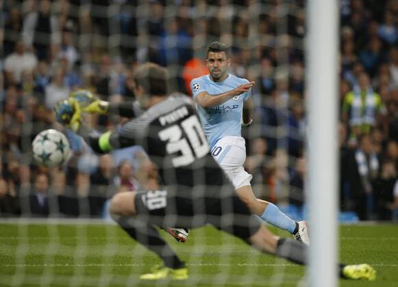 Sergio Aguero of Manchester City fires in a shot on goal during the Champions League Group F match at the Emirates Stadium, Manchester. Picture date: September 26th 2017. Picture credit should read: Andrew Yates Sportimage EDITORIAL USE ONLY. No use with unauthorised audio, video, data, fixture lists, club league logos or live services. Online in-match use limited to 120 images, no video emulation. No use in betting, games or single club league player publications.