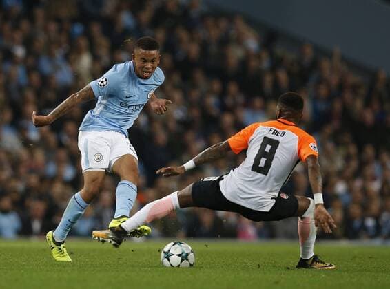 Gabriel Jesus of Manchester City tussles with Fred of Shaktar Donetsk during the Champions League Group F match at the Emirates Stadium, Manchester. Picture date: September 26th 2017. Picture credit should read: Andrew Yates Sportimage EDITORIAL USE ONLY. No use with unauthorised audio, video, data, fixture lists, club league logos or live services. Online in-match use limited to 120 images, no video emulation. No use in betting, games or single club league player publications.