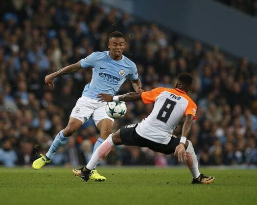 Gabriel Jesus of Manchester City tussles with Fred of Shaktar Donetsk during the Champions League Group F match at the Emirates Stadium, Manchester. Picture date: September 26th 2017. Picture credit should read: Andrew Yates Sportimage EDITORIAL USE ONLY. No use with unauthorised audio, video, data, fixture lists, club league logos or live services. Online in-match use limited to 120 images, no video emulation. No use in betting, games or single club league player publications.