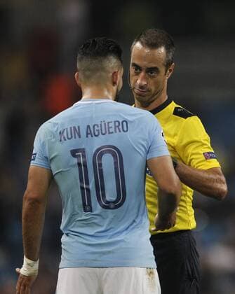 26th September 2017, Etihad Stadium, Manchester, England; UEFA Champions League football, Manchester City versus Shakhtar Donetsk; Referee Manuel De Souza (POR) makes a point to Sergio Aguero of Manchester City  ActionPlus11934266