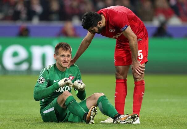 MOSCOW, RUSSIA - SEPTEMBER 26, 2017: Spartak Moscow s goalkeeper Artyom Rebrov (L) gets an injury in the 2017 18 UEFA Champions League Group E Round 2 football match against Liverpool at Otkrytie Arena Stadium. Artyom Korotayev TASS  TS062001