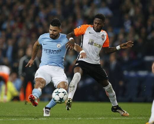 Sergio Aguero of Manchester City shoots under pressure from Fred of Shaktar Donetsk during the Champions League Group F match at the Emirates Stadium, Manchester. Picture date: September 26th 2017. Picture credit should read: Andrew Yates Sportimage EDITORIAL USE ONLY. No use with unauthorised audio, video, data, fixture lists, club league logos or live services. Online in-match use limited to 120 images, no video emulation. No use in betting, games or single club league player publications.