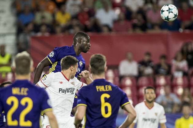 September 26, 2017 - Seville, Spain - Jean-Claude Billong of Maribor (C ) hits during the UEFA Champions League Group E soccer match between Sevilla FC and NK Maribor at Estadio Ramon Sanchez Pizjuan Soccer 2017 - Sevilla FC vs NK Maribor - ZUMAa142 20170926_zap_a142_021 Copyright: xDanielxGonzalezxAcunax