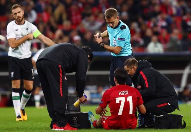 MOSCOW, RUSSIA - SEPTEMBER 26, 2017: Spartak Moscow s Ivelin Popov (C below) receives medical assistance in the 2017 18 UEFA Champions League Group E Round 2 football match against Liverpool at Otkrytie Arena Stadium. The game ended in a 1-1 draw. Artyom Korotayev TASS  TS062017
