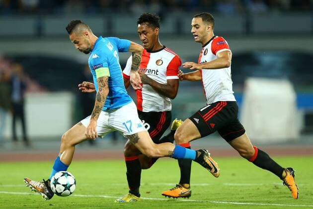 September 26, 2017 - Naples, Italy - Marek Hamsik of Napoli and Sofyan Amrabat of Feyenoordduring the UEFA Champion s League Group F football match Napoli vs Feyenoord Rotterdam on September 26, 2017 at the San Paolo stadium in Naples. Champions League: Napoli v Feyenoord  - ZUMAn230 20170926_zaa_n230_296 Copyright: xMatteoxCiambellix