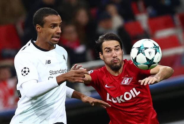 MOSCOW, RUSSIA - SEPTEMBER 26, 2017: Liverpool s Joel Matip (L) and Spartak Moscow s Ivelin Popov fight for the ball in their 2017 18 UEFA Champions League Group E Round 2 football match at Otkrytie Arena Stadium. The game ended in a 1-1 draw. Stanislav Krasilnikov TASS  TS062056