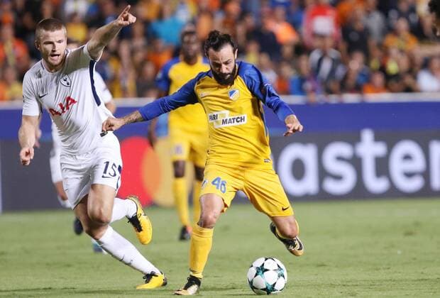 (170927) -- ISTANBUL, NICOSIA. 27, 2017 -- Apoel s Stathis Aloneftis(R) vies for the ball during the Champions League Group H game between Apoel Nicosia and Tottenham Hotspur at GSP Stadium in Nicosia, Cyprus, Sept. 26, 2017. Tottenham won the match 3-0.) (SP)CYPRUS-NICOSIA-SOCCER-UEFA CHAMPIONS LEAGUE SakisxSavvides 