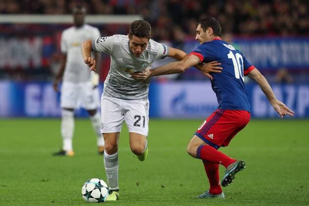 MOSCOW, RUSSIA - SEPTEMBER 27, 2017: Manchester United ManU s Ander Herrera (L front) and CSKA Moscow s Alan Dzagoyev (R) in their 2017 2018 UEFA Champions League Group A football match at CSKA Stadium. Sergei Savostyanov TASS  TS062286