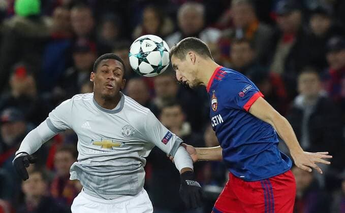 MOSCOW, RUSSIA - SEPTEMBER 27, 2017: Manchester United ManU s Anthony Martial (L) and CSKA Moscow s Viktor Vasin in their 2017 2018 UEFA Champions League Group A football match at CSKA Stadium. Sergei Savostyanov TASS  TS0622A2