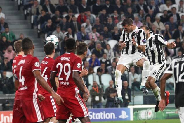 September 27, 2017 - Turin, Italy - Juventus midfielder Stefano Sturaro (27) heads the ball during the Uefa Champions League group stage football match n.2 JUVENTUS - OLYMPIACOS on 27 09 2017 at the Allianz Stadium in Turin, Italy. Juventus v Olympiakos - UEFA Champions League  - ZUMAn230 20170927_zaa_n230_276 Copyright: xMatteoxBottanellix