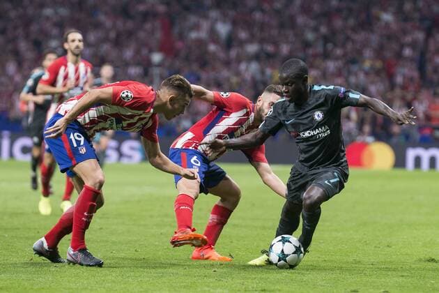 Atletico de Madrid s Lucas Hernanez and Koke Resurreccion and Chelsea s N’Golo Kante during UEFA Champions League match between Atletico de Madrid and Chelsea at Wanda Metropolitano in Madrid, Spain September 27, 2017.  (20170927057)